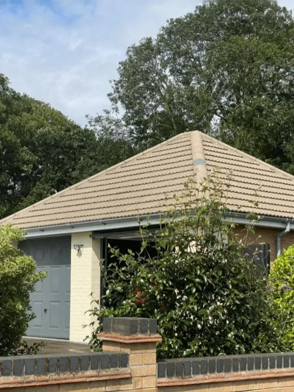 Clean lines of newly fitted white uPVC fascia boards and ventilated soffits on a residential gable end. Installed by Norfolk Exterior Solutions